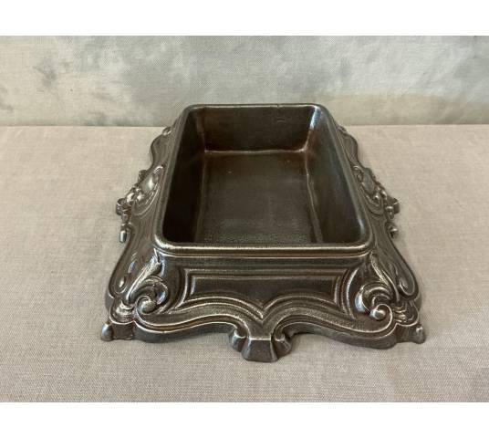 Cast iron receptacle, fully polished and varnished, dating from the 19th century.