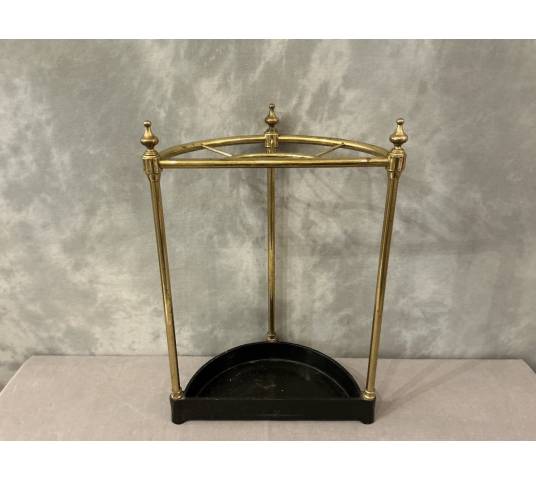 Semi-circular umbrella stand in brass and cast iron, circa 1900