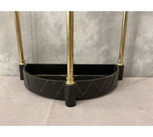 Semi-circular umbrella stand in brass and cast iron, circa 1900