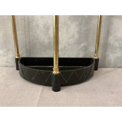 Semi-circular umbrella stand in brass and cast iron, circa 1900