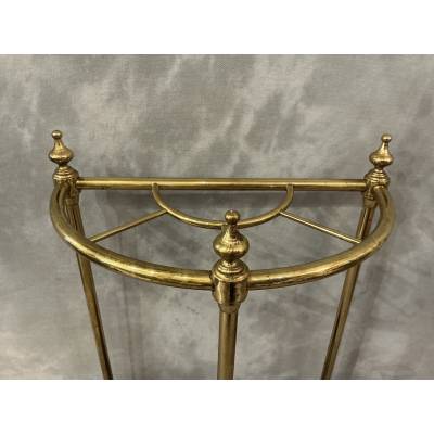 Semi-circular umbrella stand in brass and cast iron, circa 1900