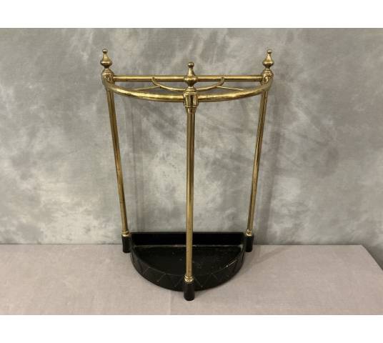 Semi-circular umbrella stand in brass and cast iron, circa 1900