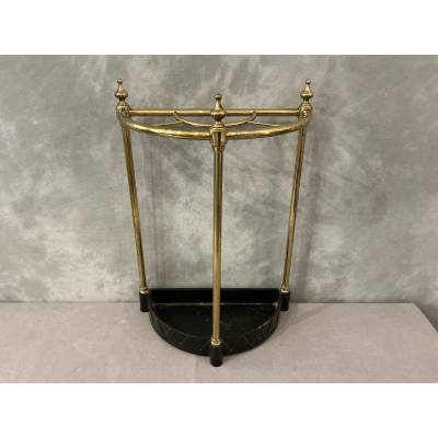 Semi-circular umbrella stand in brass and cast iron, circa 1900