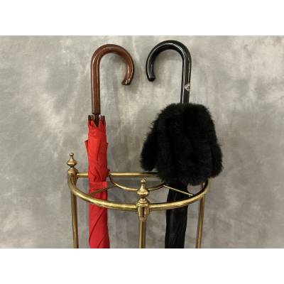 Semi-circular umbrella stand in brass and cast iron, circa 1900
