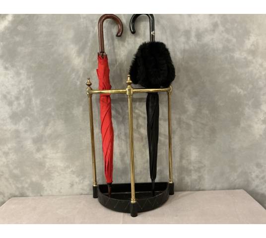Semi-circular umbrella stand in brass and cast iron, circa 1900