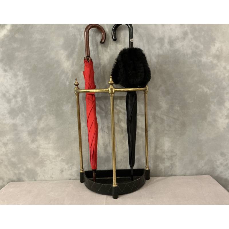 Semi-circular umbrella stand in brass and cast iron, circa 1900