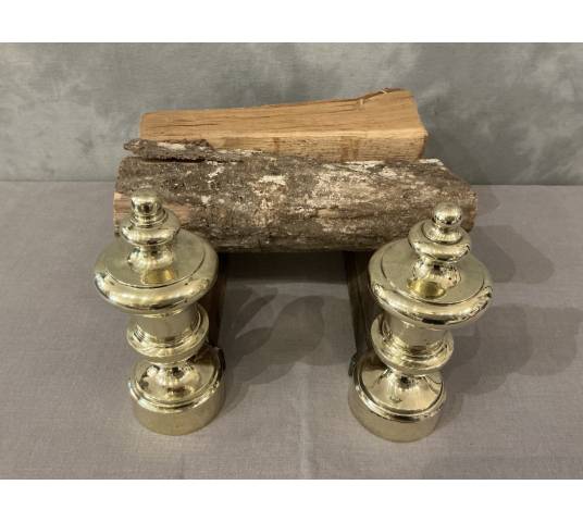 Pair of antique cast iron and brass andirons from the 19th century