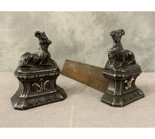Pair of antique cast iron andirons depicting goats from the 19th century