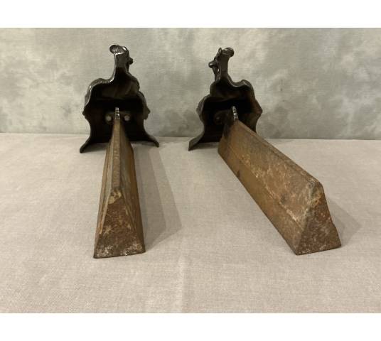 Pair of antique cast iron andirons depicting goats from the 19th century