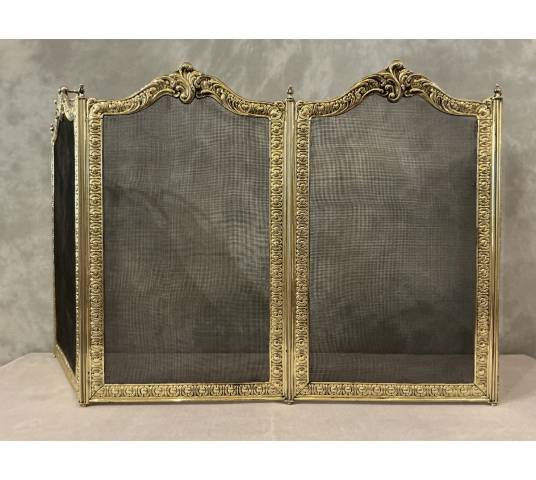 Antique brass fireplace screen from the 19th century