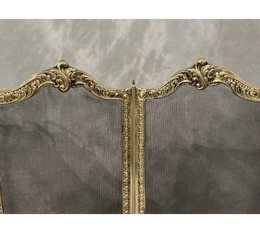 Antique brass fireplace screen from the 19th century