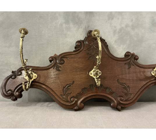 Coat rack, wooden hooks, bronze model from the late 19th century