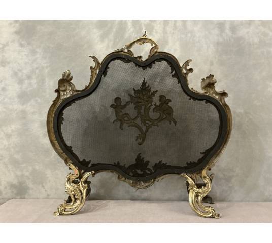 Ecran de cheminée en bronze poli et vernis d'époque 19 ème