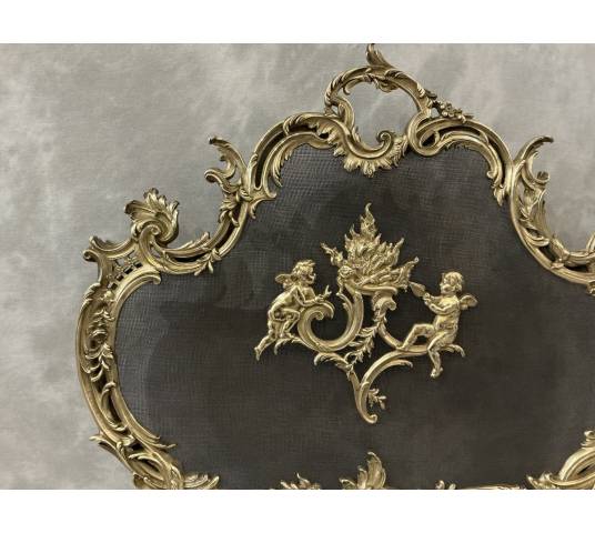 Ecran de cheminée en bronze poli et vernis d'époque 19 ème