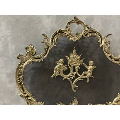 Ecran de cheminée en bronze poli et vernis d'époque 19 ème