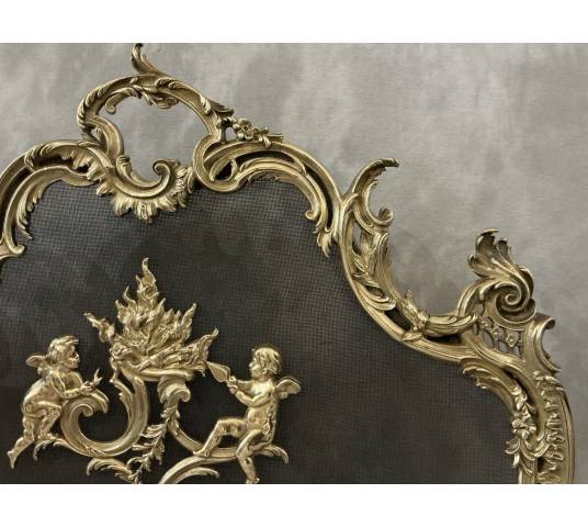 Ecran de cheminée en bronze poli et vernis d'époque 19 ème