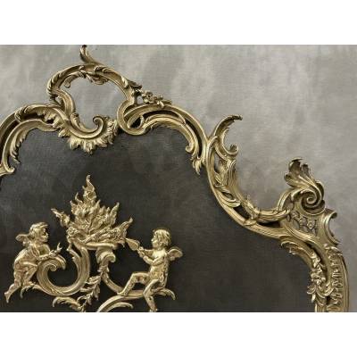 Ecran de cheminée en bronze poli et vernis d'époque 19 ème