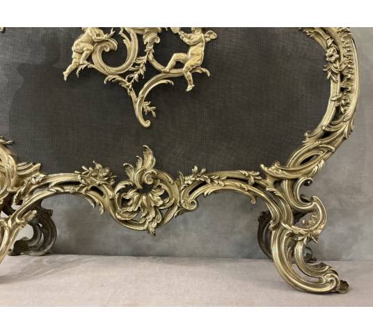 Ecran de cheminée en bronze poli et vernis d'époque 19 ème