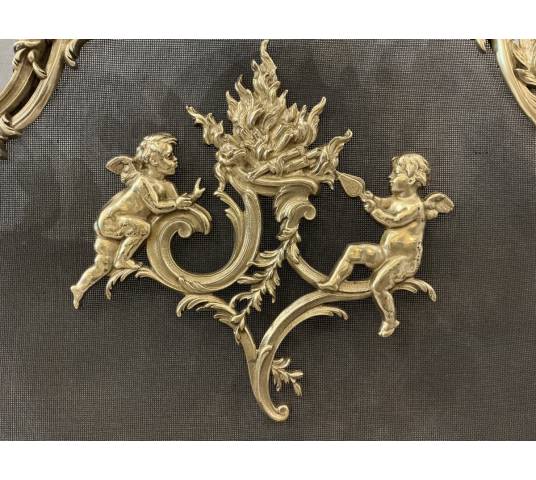 Ecran de cheminée en bronze poli et vernis d'époque 19 ème