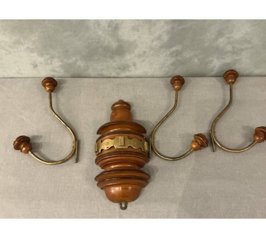 Coat rack, wooden and gilded iron hooks circa 1900