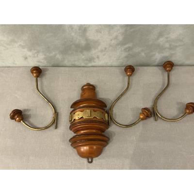 Coat rack, wooden and gilded iron hooks circa 1900