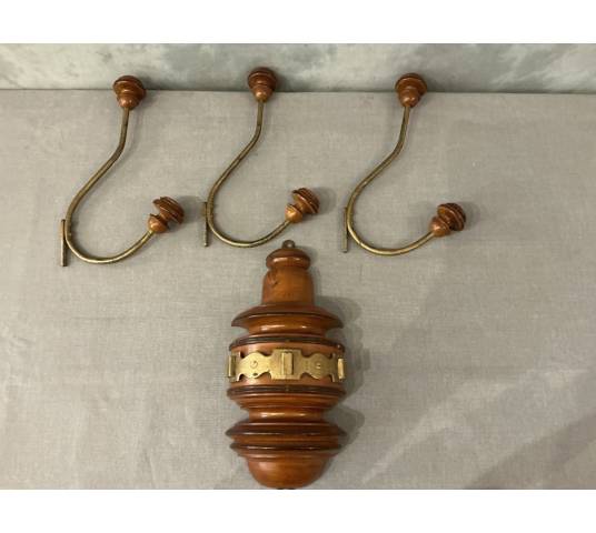 Coat rack, wooden and gilded iron hooks circa 1900