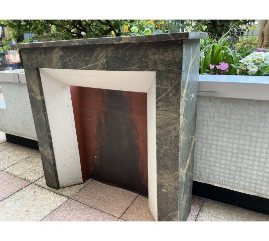 Decorative fireplace in painted wood, faux marble style, dating from the late 19th century