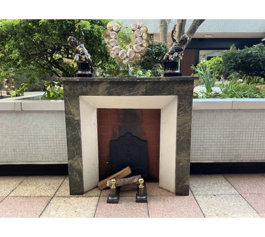 Decorative fireplace in painted wood, faux marble style, dating from the late 19th century