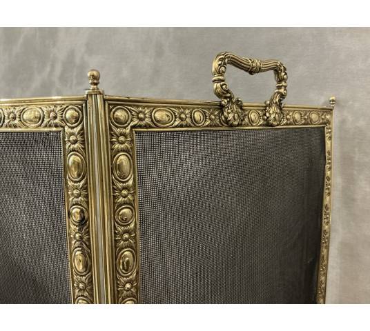 Pare feu de cheminée ancien en laiton pressé d'époque 19 ème