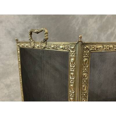 Pare feu de cheminée ancien en laiton pressé d'époque 19 ème