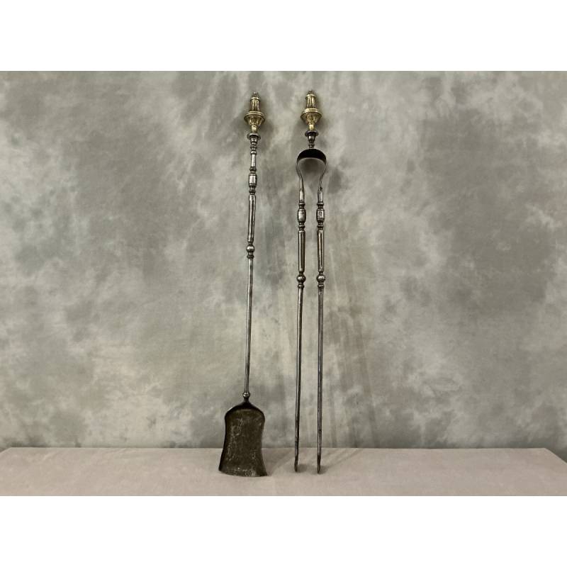 Large set of a shovel and tongs in iron and bronze from the 19th century