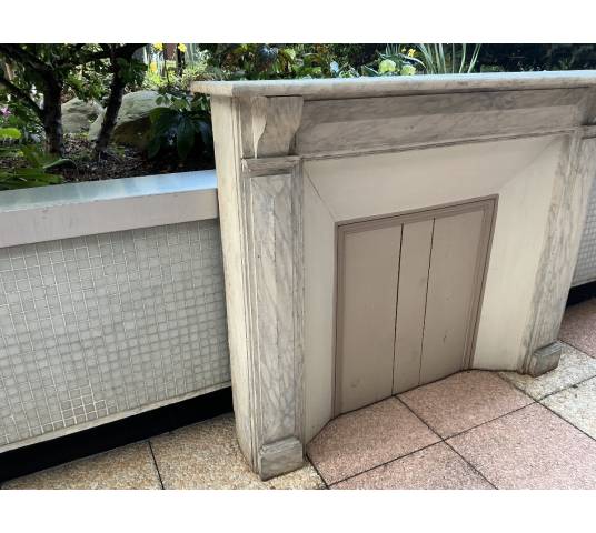 Decorative painted wooden fireplace from the late 19th century