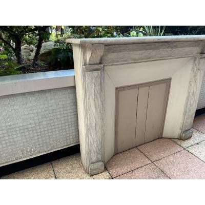 Decorative painted wooden fireplace from the late 19th century
