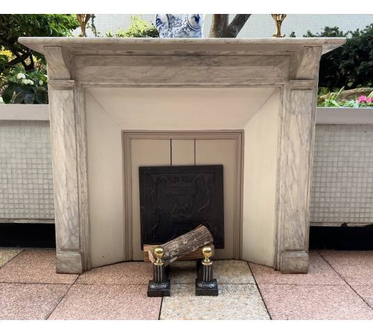Decorative painted wooden fireplace from the late 19th century
