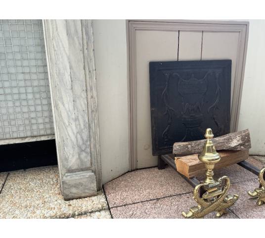 Decorative painted wooden fireplace from the late 19th century