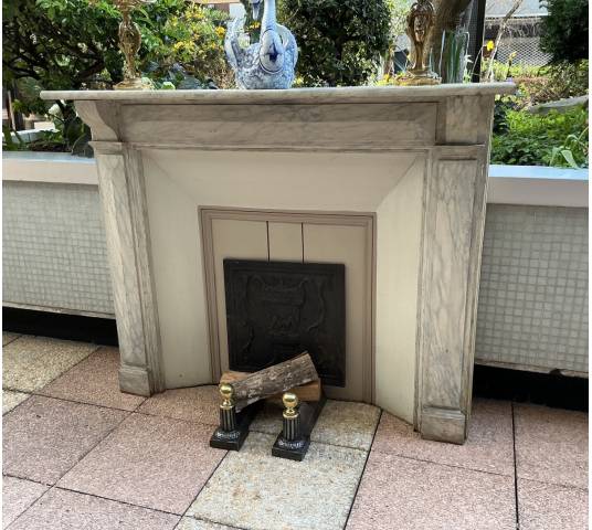 Decorative painted wooden fireplace from the late 19th century
