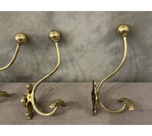 Set of 4 brass coat hooks/hooks from the 19th century