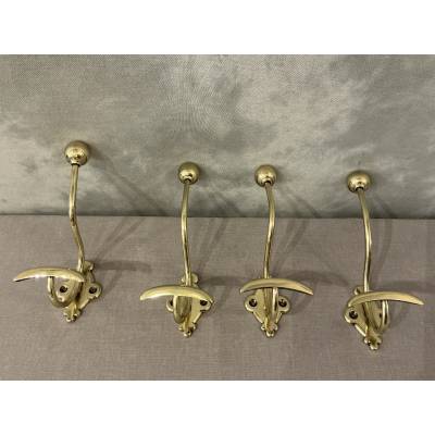 Set of 4 brass coat hooks/hooks from the 19th century