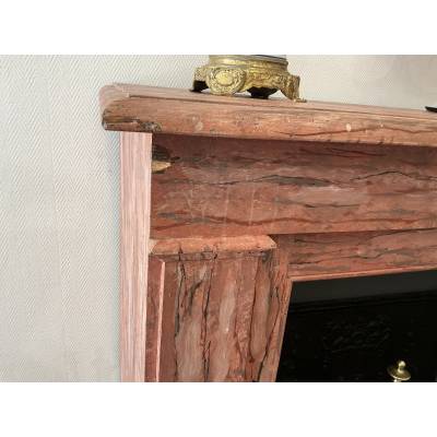 Decorative painted wooden fireplace from the late 19th century
