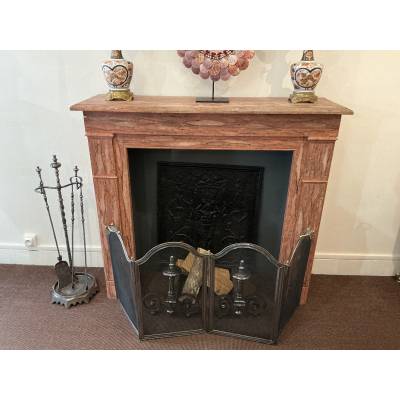Decorative painted wooden fireplace from the late 19th century