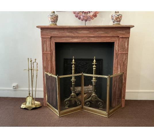 Decorative painted wooden fireplace from the late 19th century