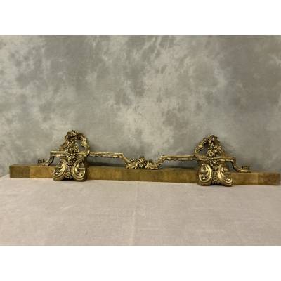 19th century bronze and brass fireplace bar
