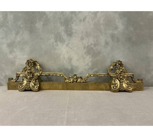 19th century bronze and brass fireplace bar