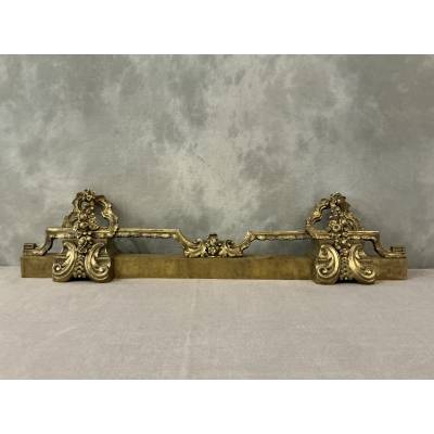 19th century bronze and brass fireplace bar
