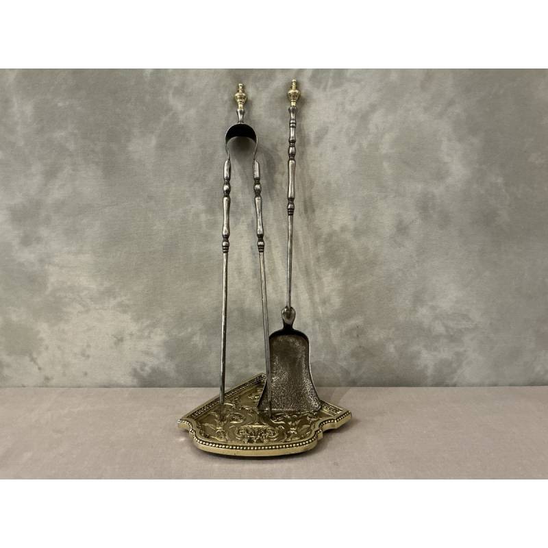 Bronze shovel and fireplace tongs rest