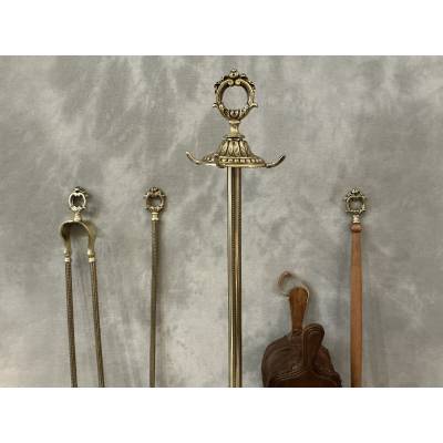 Antique 19th-century brass mantelpiece in the Louis XVI style