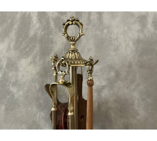 Antique 19th-century brass mantelpiece in the Louis XVI style