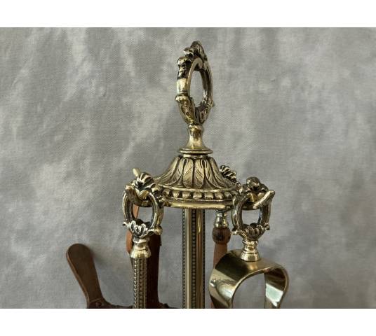 Antique 19th-century brass mantelpiece in the Louis XVI style