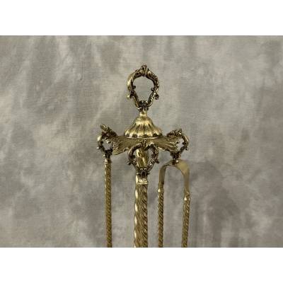 Antique brass fireplace set from the 19th century