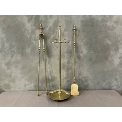 Antique brass fireplace set from the 19th century